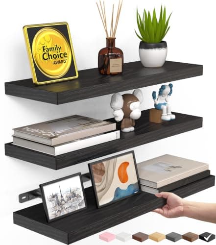 A styled shelf with vases, books, and ceramics