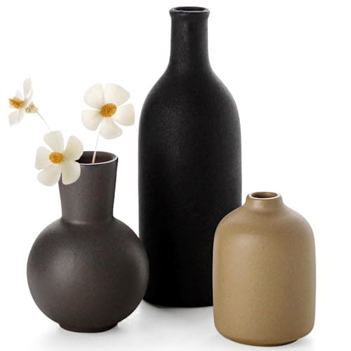 Ceramic vases styled on a shelf
