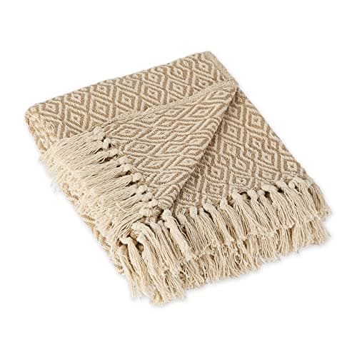 Textured throw pillows arranged on a sofa