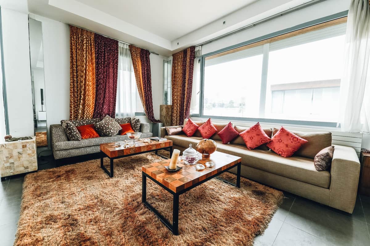 A textured area rug anchoring a living room