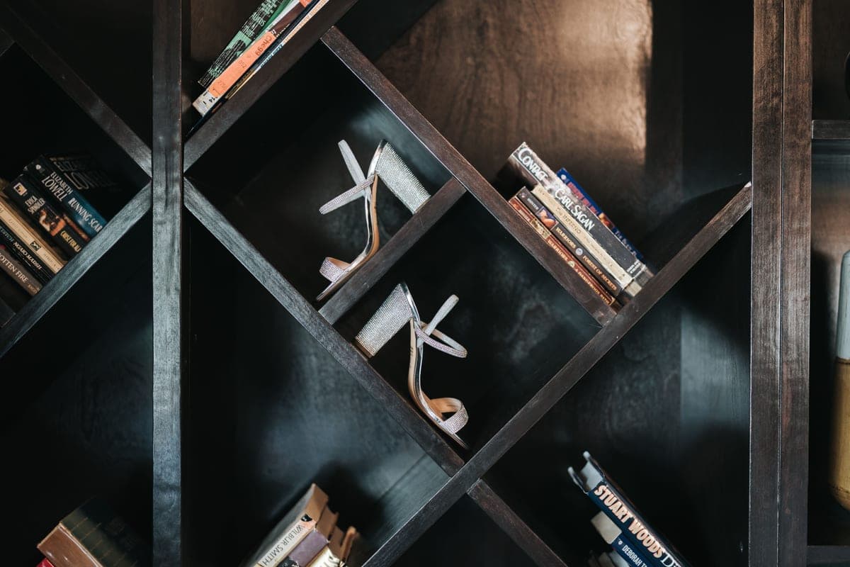 A styled bookshelf with books and decor