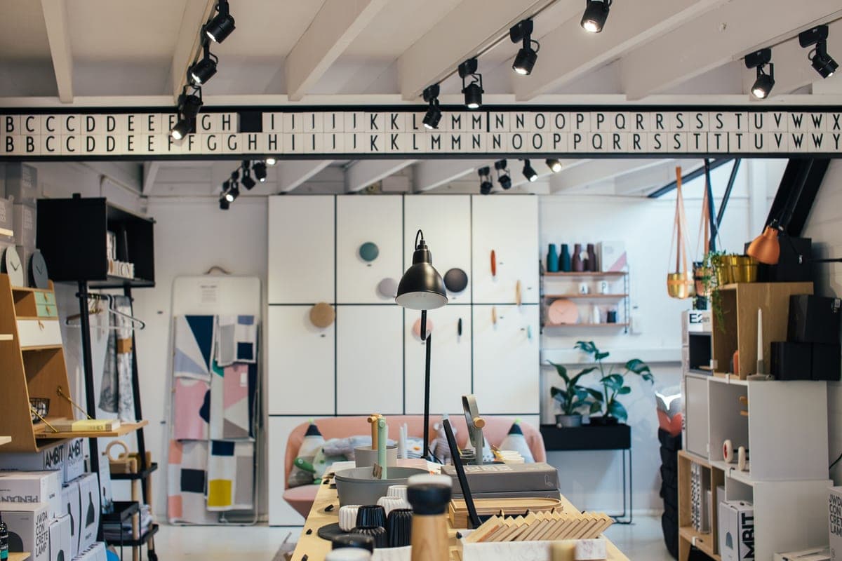 Home decor displayed on boutique shelves