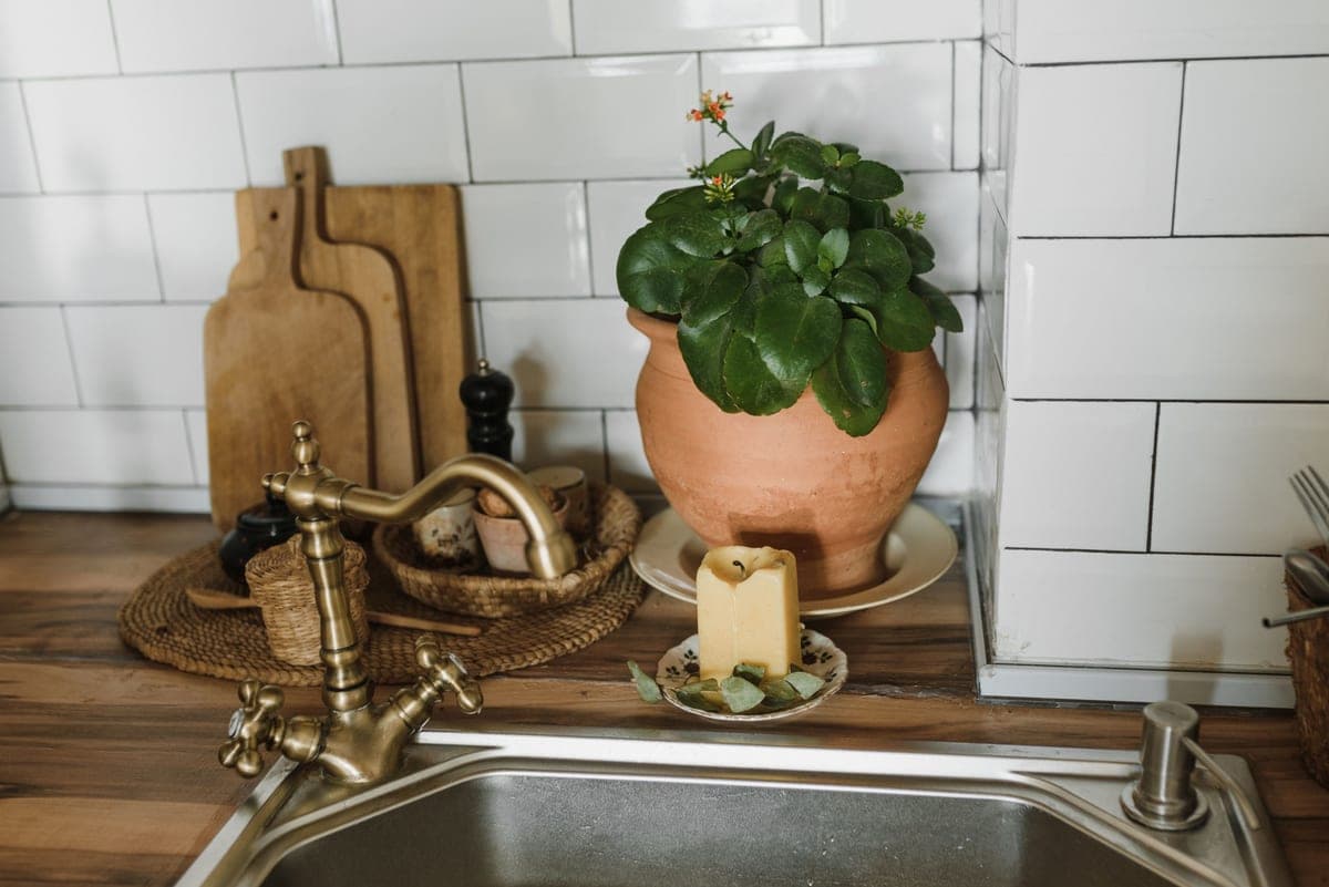 A warm kitchen with wood counters and decor