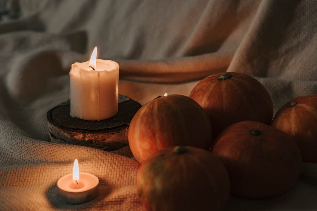 Tasteful Halloween decor with pumpkins and candles