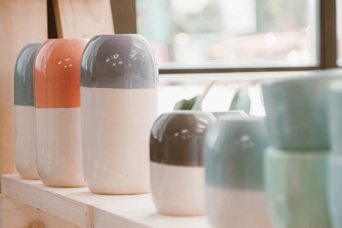 Ceramic vases styled on a shelf