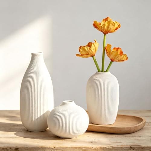 Ceramic vases styled on a shelf