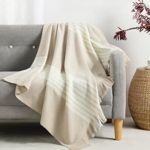 Textured throw pillows arranged on a sofa