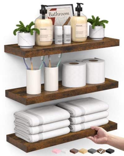 A styled shelf with vases, books, and ceramics