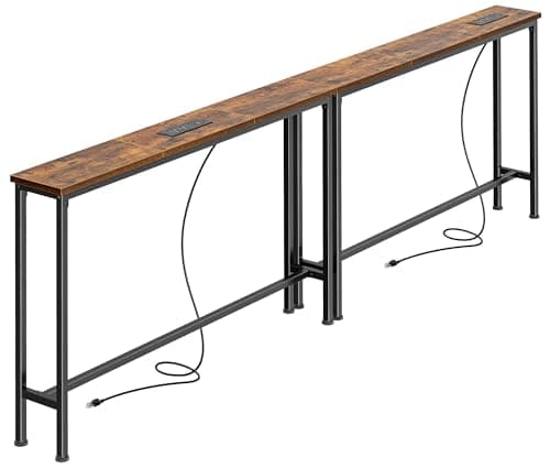 An entryway console table with decor and a mirror