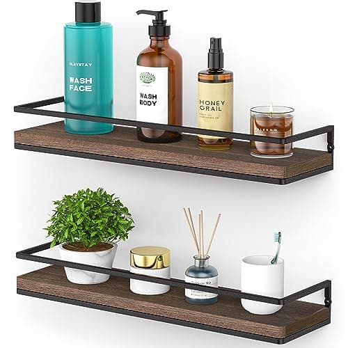 A styled shelf with vases, books, and ceramics