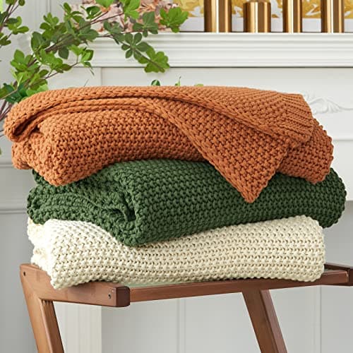 Textured throw pillows arranged on a sofa